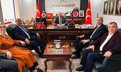 Duran Bıyık ve il genel meclisi üyelerinden MHP’ye ziyaret