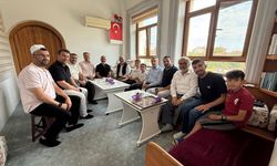 Başkan Aşgın’dan hacdan dönen Zeki Akbatu’ya ziyaret