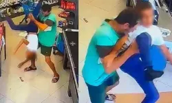 Market çalışanları gözlerine inanamadı: Küçük çocuğu acımasızca yerden yere vurdu