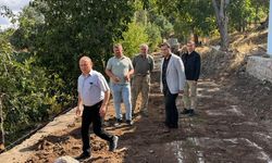 Ağaççamı Köyü’ndeki istinat duvarı çalışmalarını inceledi