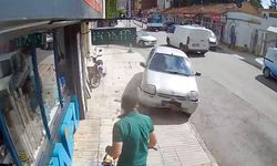 Kaldırıma çıkan otomobilin altında kalmaktan son anda kurtuldu