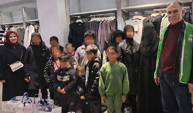 Çorum'da 41 yetimin yüzü giyim desteğiyle güldü