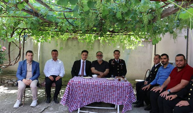 Boğazkale protokolünden şehit ailelerine ziyaret